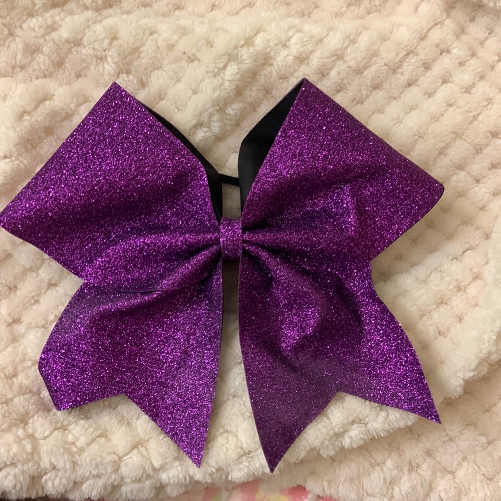 Purple sparkly cheer bow
